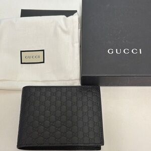 Gucci Black Embossed GG Leather Wallet***